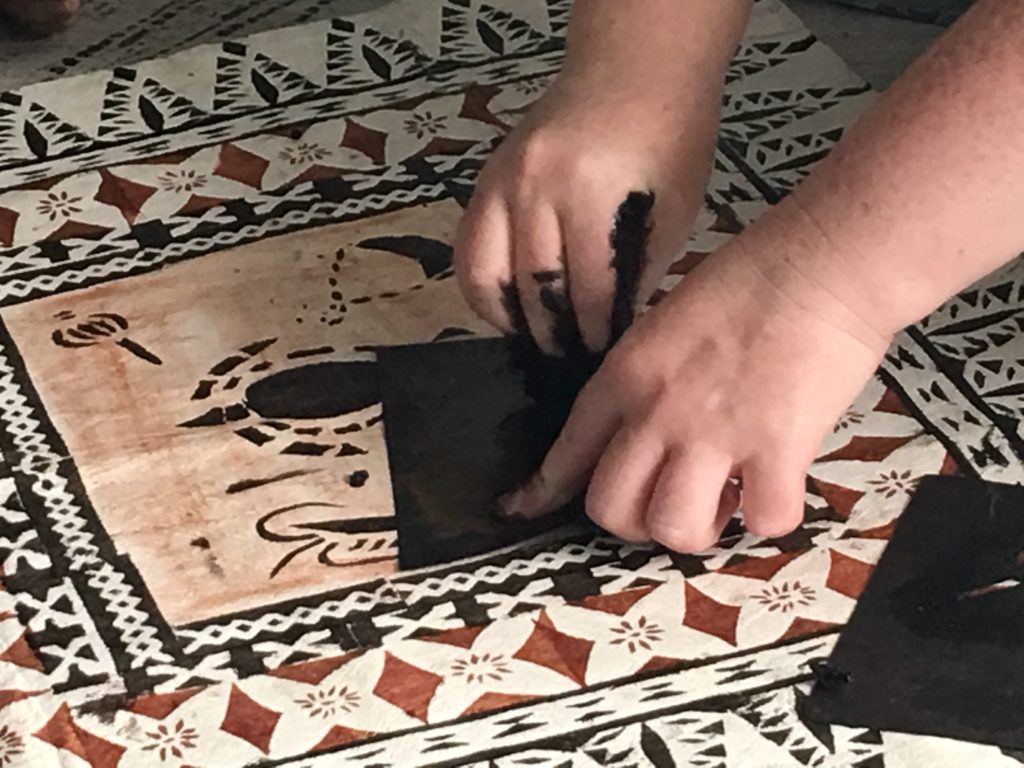 Tapa making using black ink