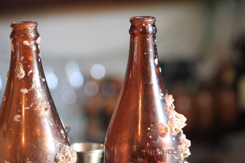 Old beer bottles at Pegleg bar in Sydney
